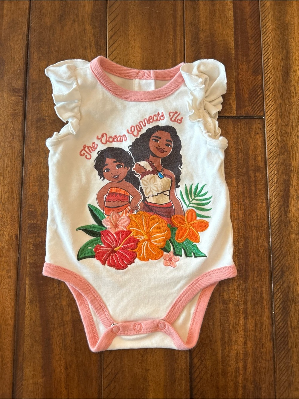 Disney is Moana White & Pink Girls' One-Piece Bodysuit with Tropical Print